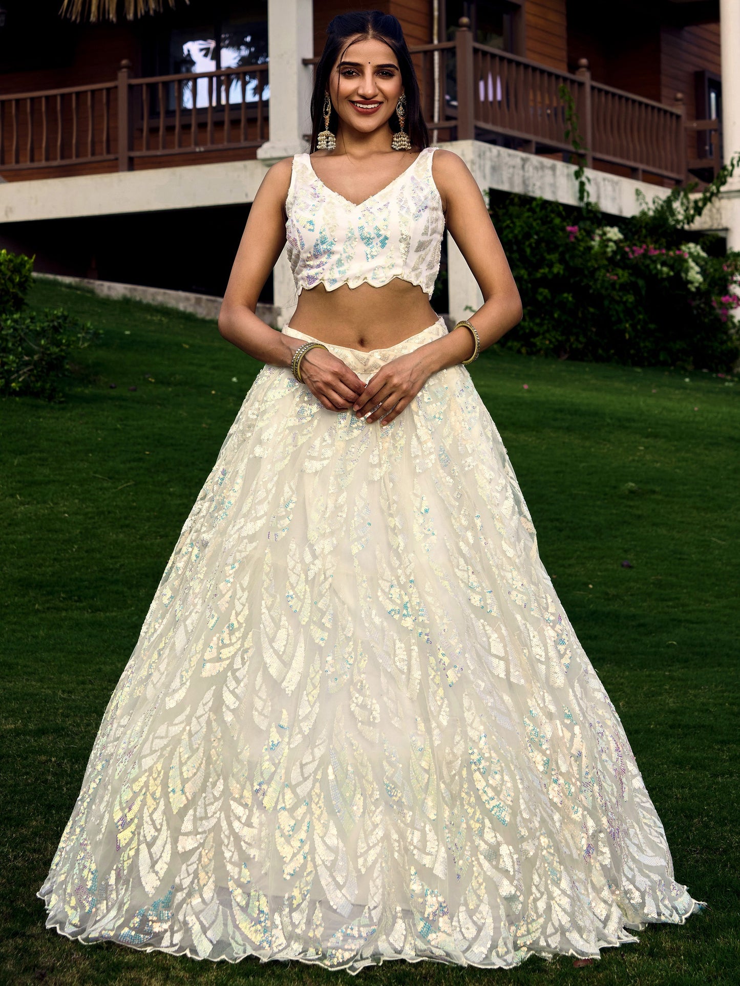White breezy lehenga crafted with thread embroidery work