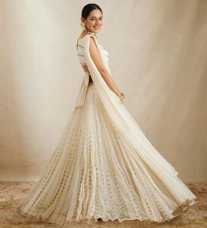 Graceful off-white sequence with zari embroidered georgette lehenga