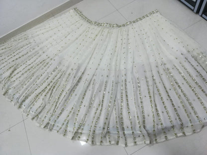 Graceful off-white sequence with zari embroidered georgette lehenga