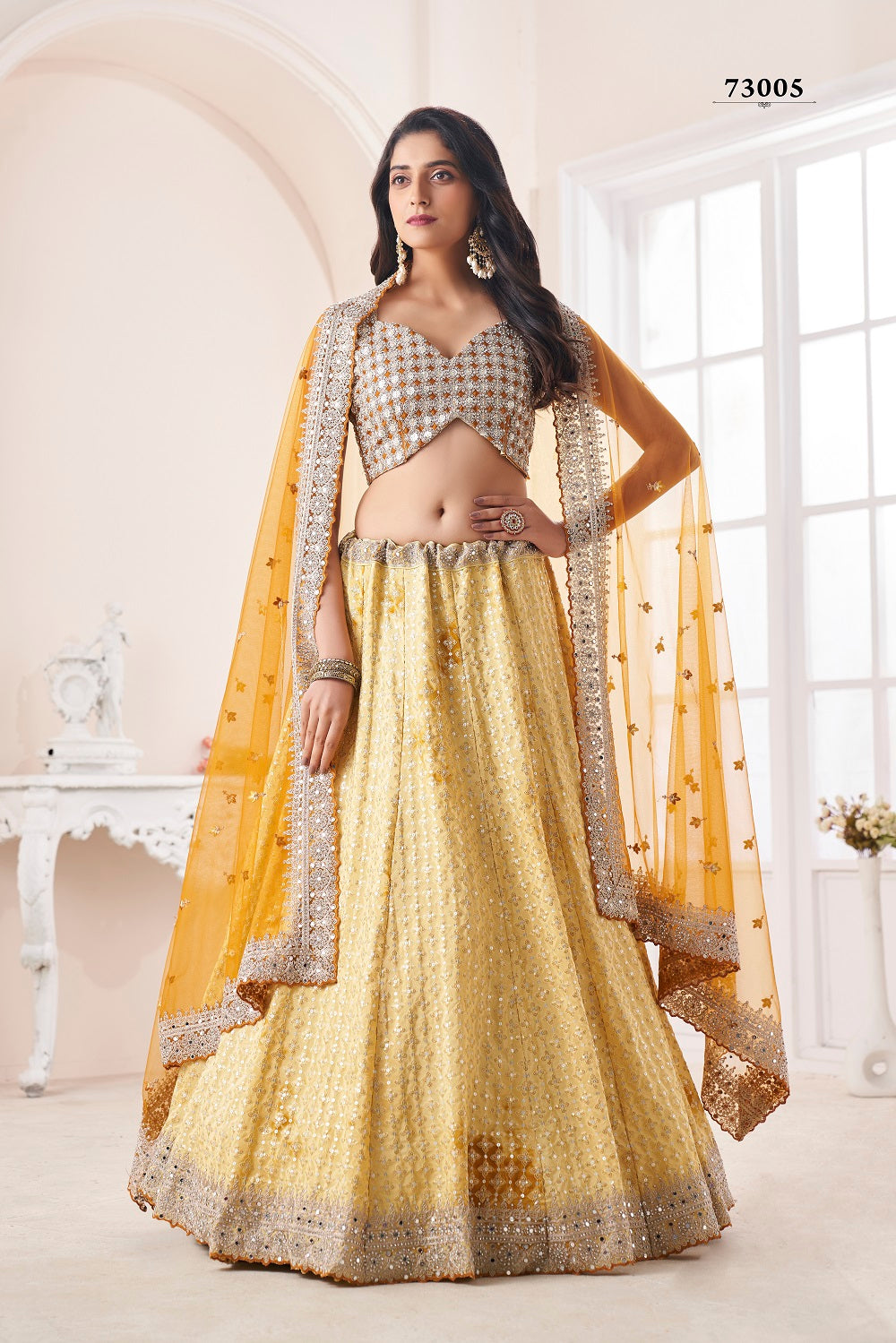 Bridal lehenga paired with brown color heavily embellished choli and two  net dupattas with heavy embroidered border in peach and maroon color  |lovelyweddingmall.com|