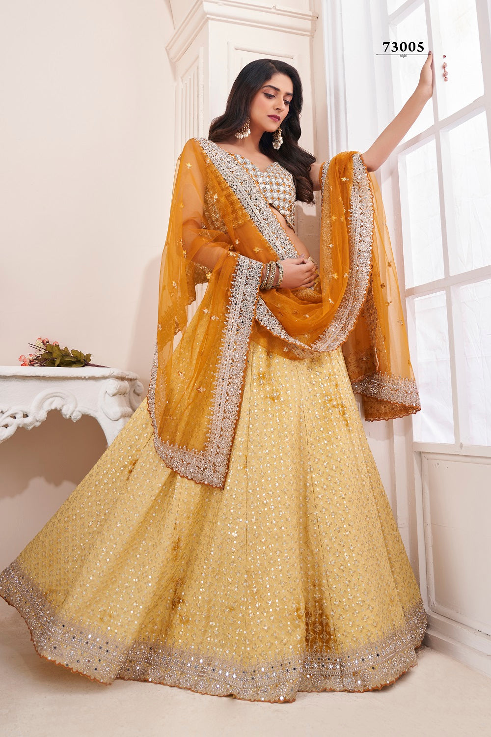 Georgette And Net Fascinate Sequins Work Reception Wear Lehenga Choli In  Yellow Color