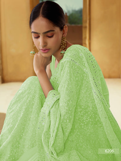 Light Moss Green color heavy designer saree - Joshindia