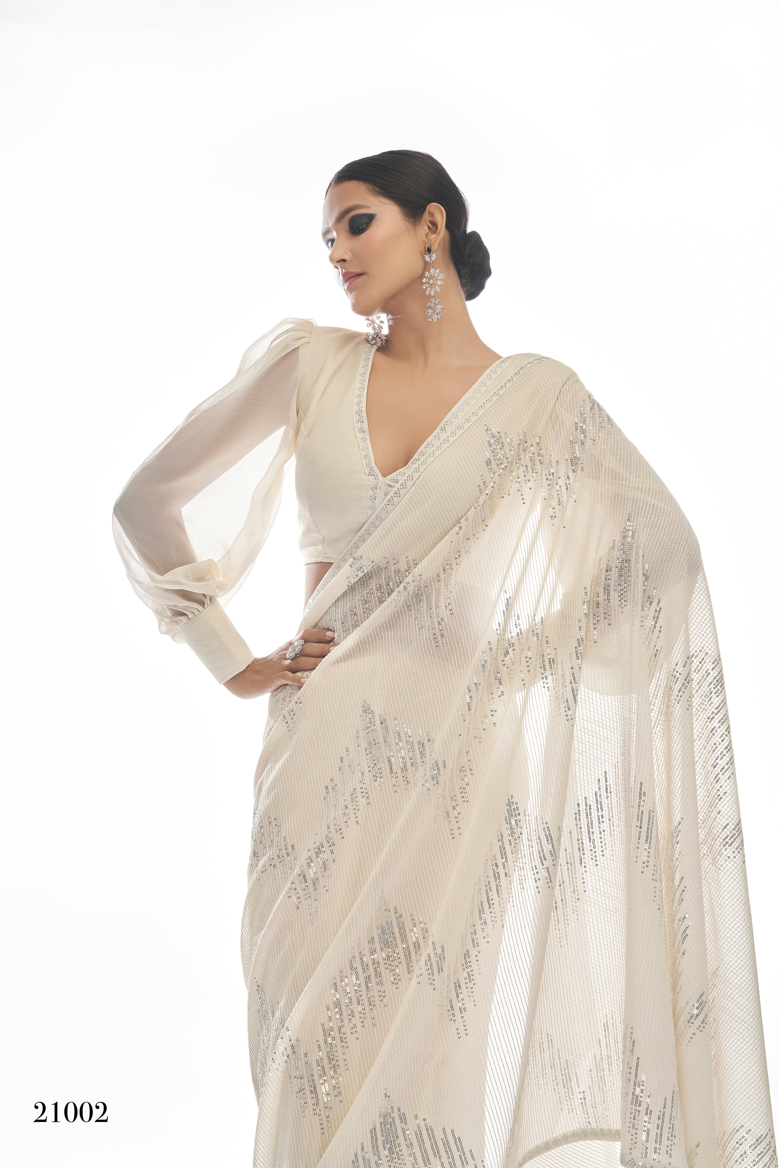 SNOW WHITE SHIMMERY SEQUIN CLASSIC SAREE PAIRED WITH A MATCHING EMBROIDERED  BLOUSE. - Seasons India