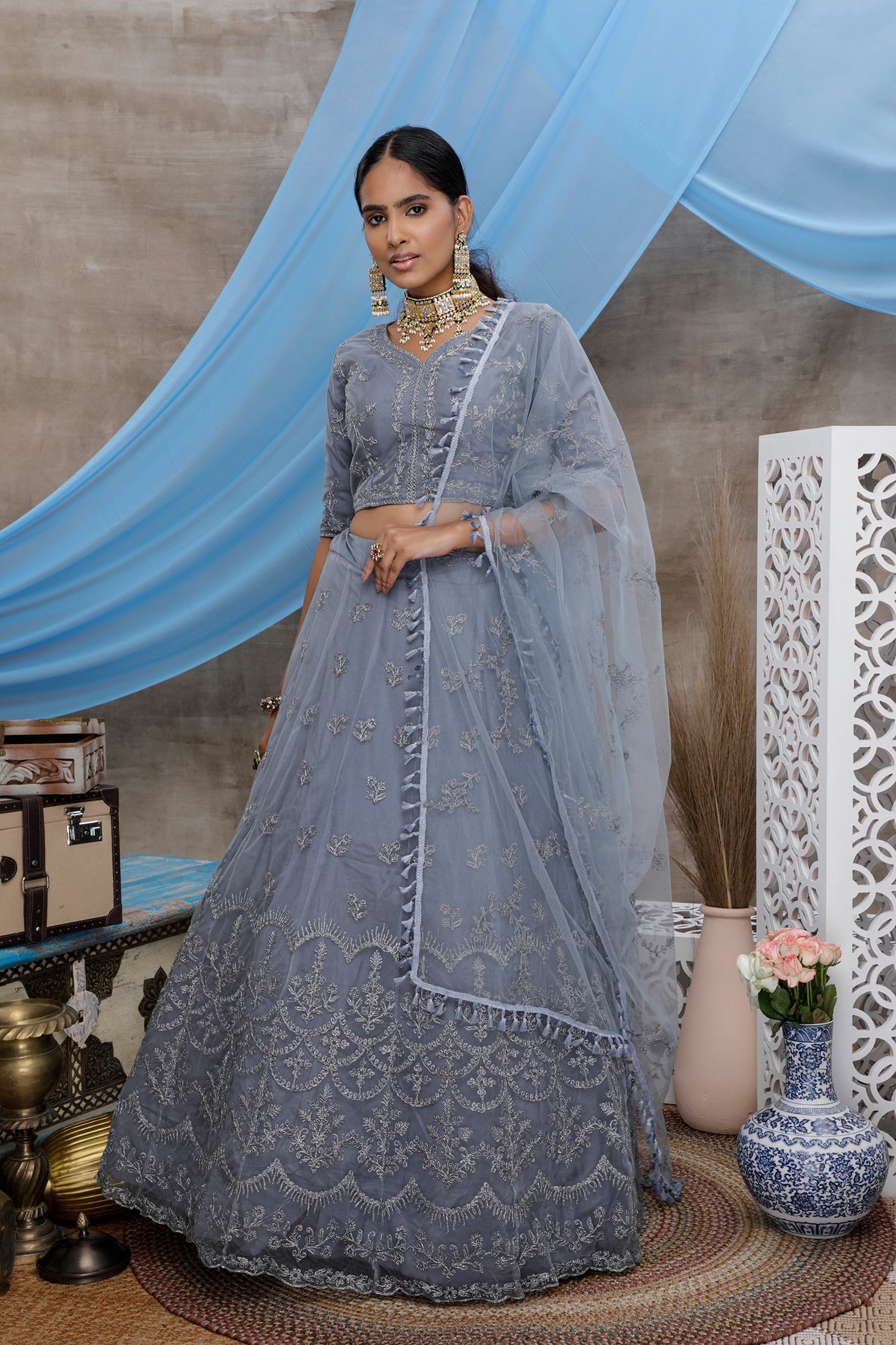 Grey Color Net Fabric Elegant Wedding Wear Lehenga With Embroidered Work