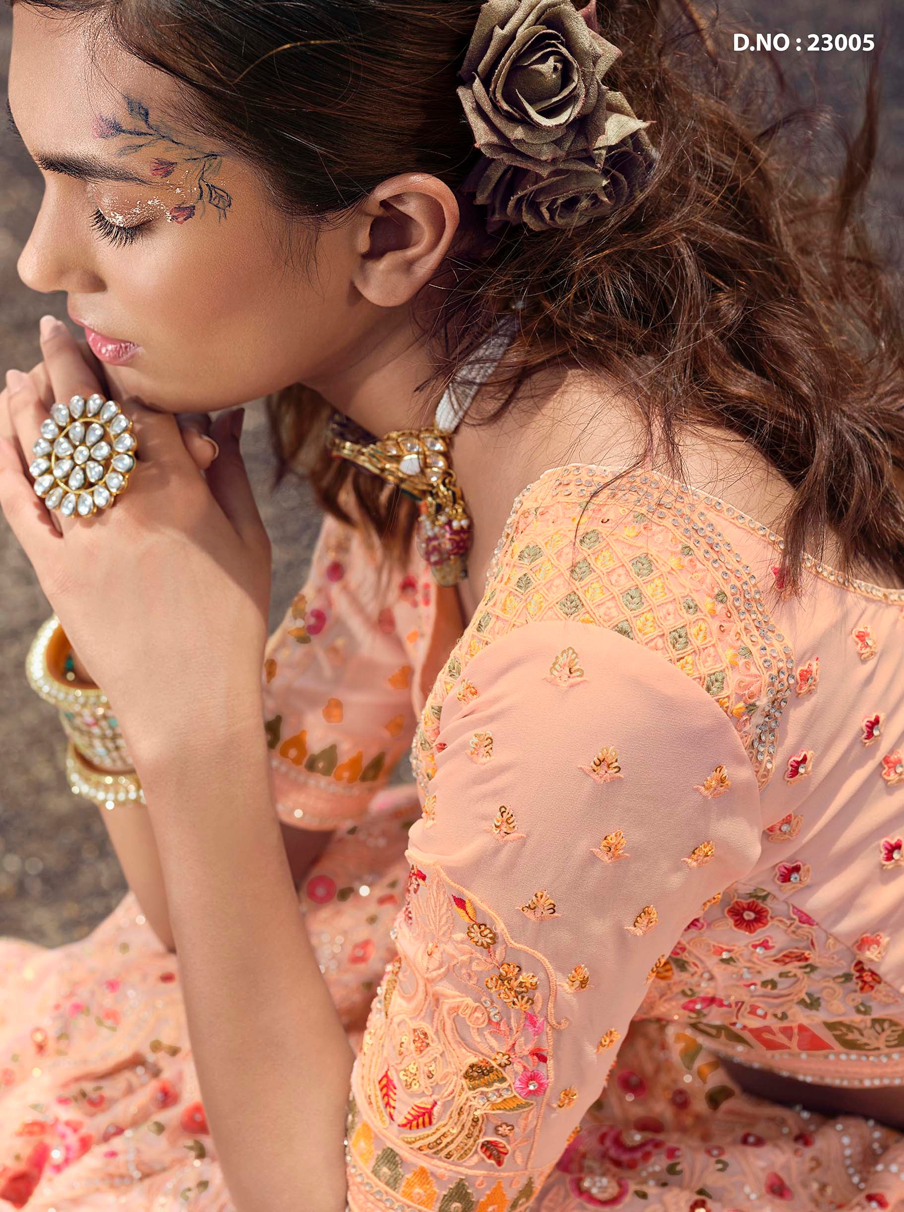 DUSTY PEACH LEHENGA SET WITH ALL OVER SILVER PATTERNED EMBROIDERY PAIRED  WITH A MATCHING DUPATTA AND TASSELS. - Seasons India