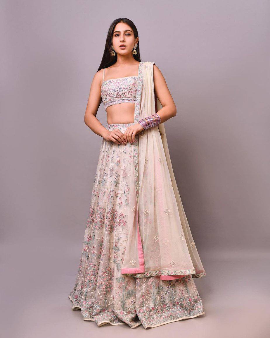 Cream and Light Pink Embroidered Net Lehenga features a dhupioni silk  blouse, net lehenga… | Indian wedding outfits, Indian fashion dresses,  Designer dresses indian